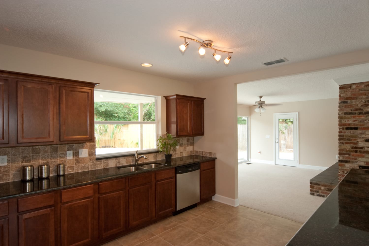 Image of a kitchen looking into a living room